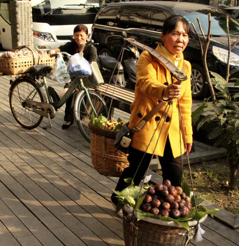 Chengdu, China street scene Photo Credit: Tom Wilmer