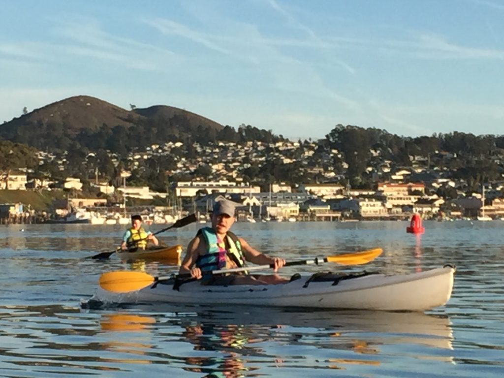 Mo Mao savoring a paddle on Morro Bay. Photo Credit: Tom Wilmer